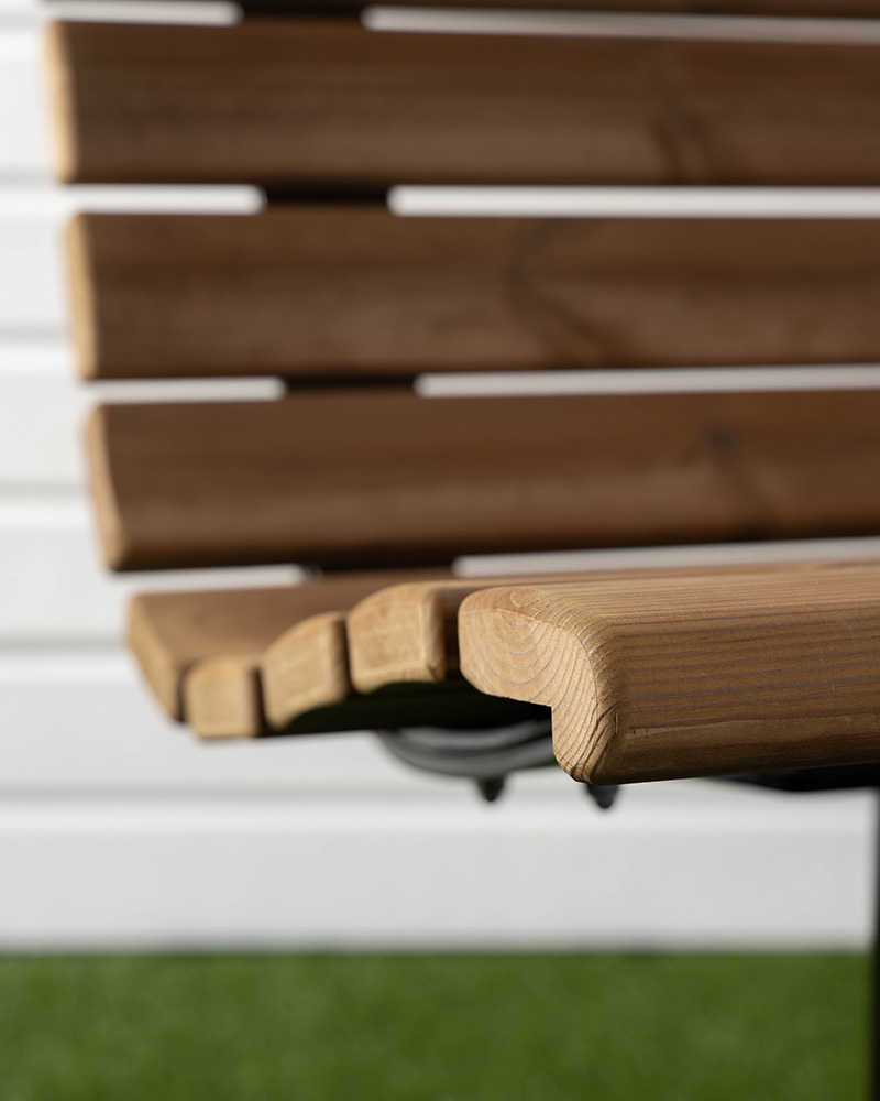 The Sofiero park chair in thermally treated pine.